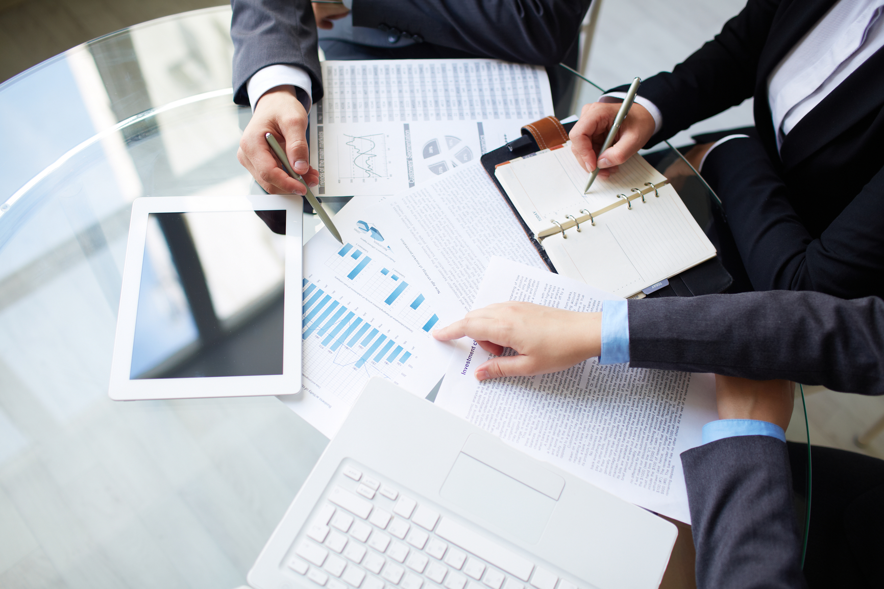 Image of human hands during work planning at meeting